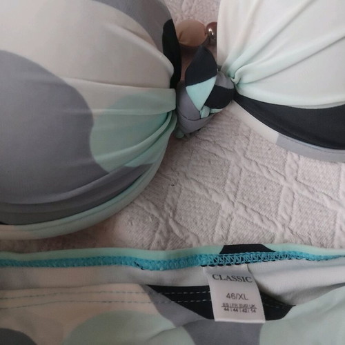 Swimsuit used in blue shades with padding and adjustable ties