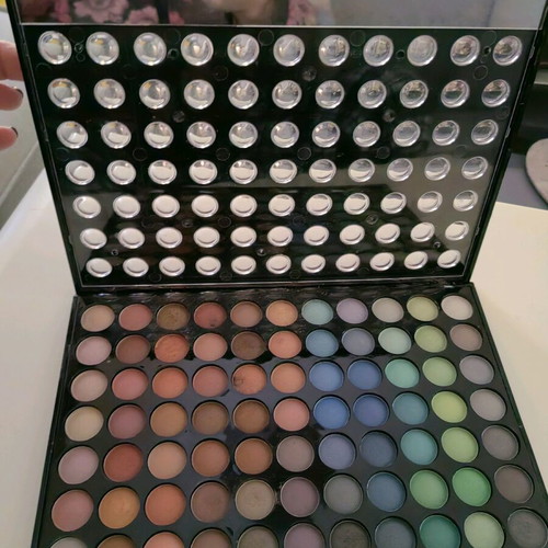 W7 Cosmetics Paintbox 77 eyeshadow palette used with broken opening