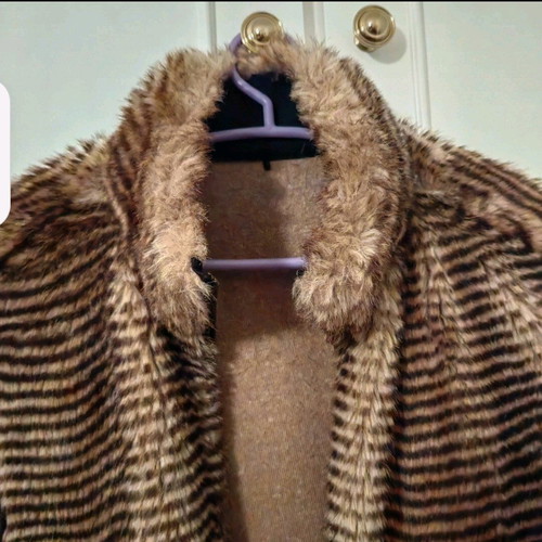 Synthetic fur vest brown like new with decorative zipper