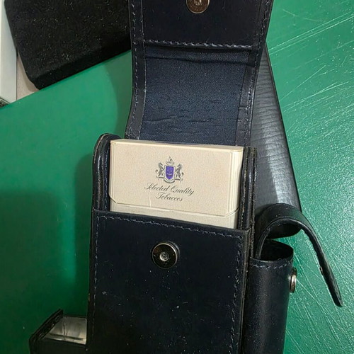 Leather tobacco case with silver frame and compartments