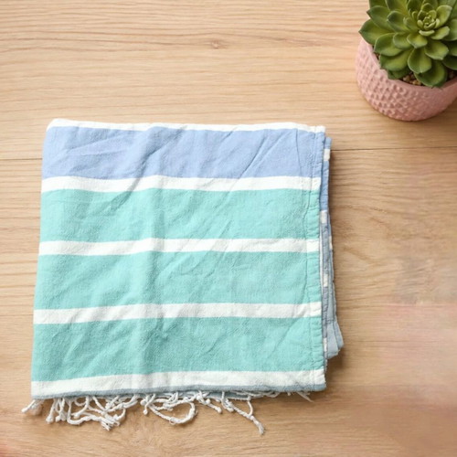 Beach towel like new, cotton top and terry bottom