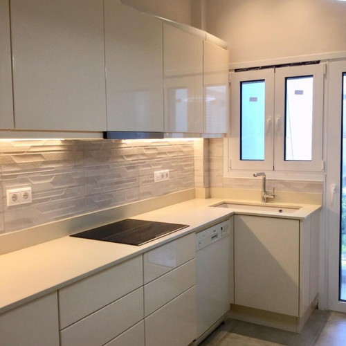 Modern kitchen with quartz countertop and granite undermount sink like new, beige lacquer