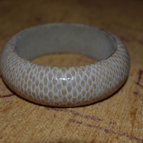 Various fixed bracelets used, multicolored, wood and plastic