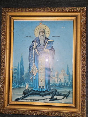 Wooden frame used with Saint Charalambos icon and crack in glass