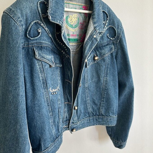 Vintage oversized denim jacket with shoulder pads and rhinestones