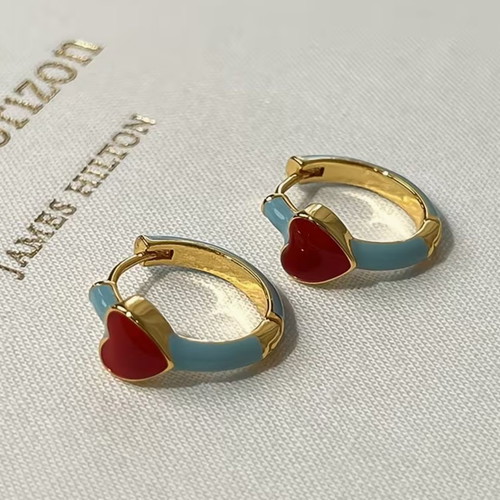 Heart hoop earrings new with gold finish and blue details