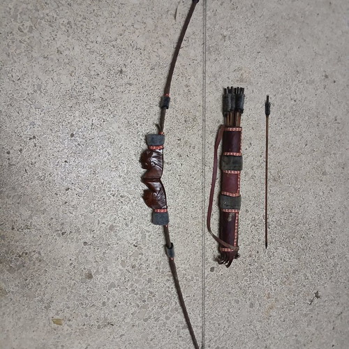 Decorative wooden carved bow with arrows like new