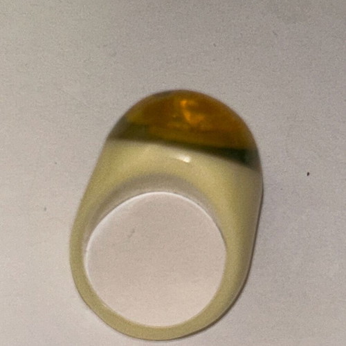 Vintage resin seahorse ring with off-white base, like new
