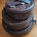 DKNY Nesting Pouch Set brown monogram, like new