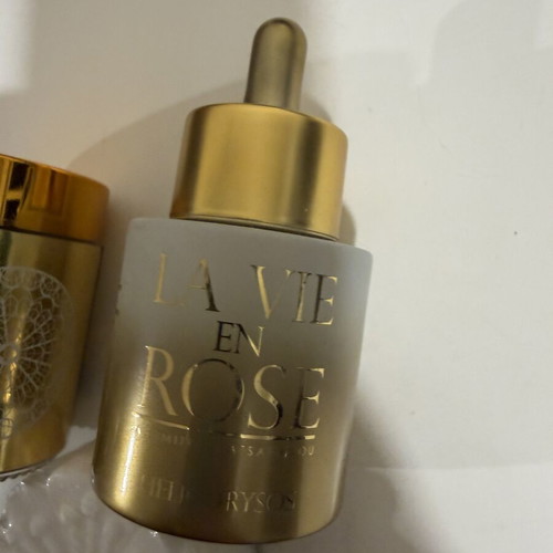 La Vie En Rose skincare set like new with scrub, face oil, and soap