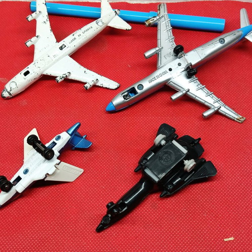 Iron toy airplanes set of 4 used, including Greek, English and Chinese