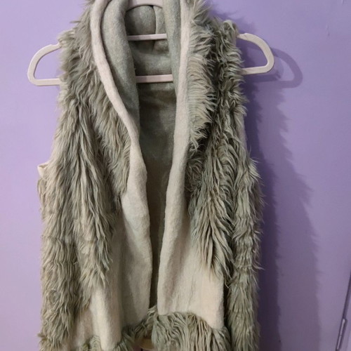 Asymmetric fur vest used, beige and sugar shades