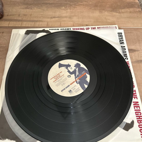 Bryan Adams So Far So Good vinyl used, with poster