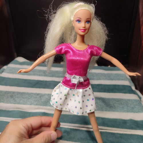 Barbie doll Mattel used with stains on dress