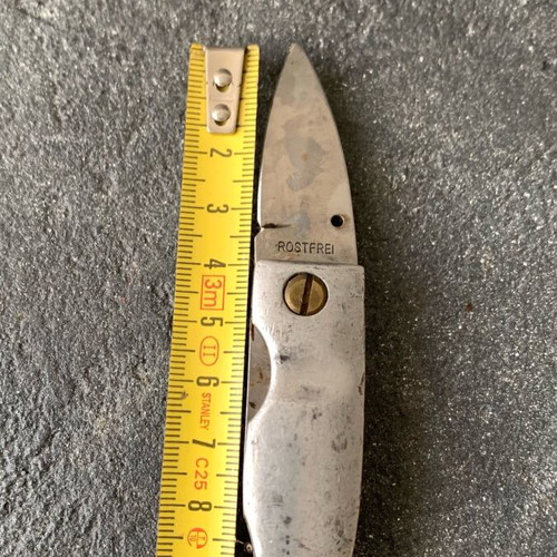 Small knife used, missing screw