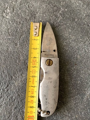 Small knife used, missing screw
