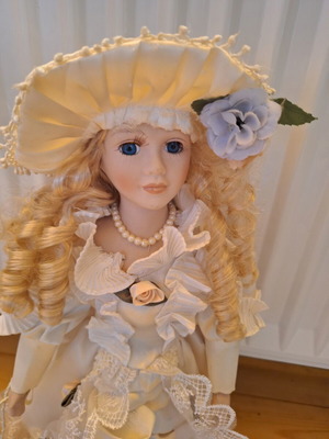 Porcelain doll 43cm