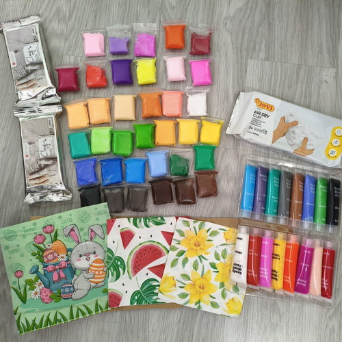 Craft supplies set used with clay, paints, silicone molds, and accessories