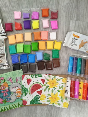 Craft supplies set used with clay, paints, silicone molds, and accessories