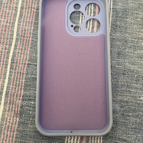 iPhone 14 Pro genuine case used with minor wear and blue case included