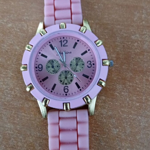 Pink watch with gold used, needs battery