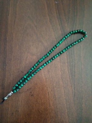 Worry beads made of green cypress glass beads used