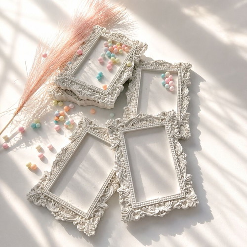 Vintage plaster frame with perfume bottle