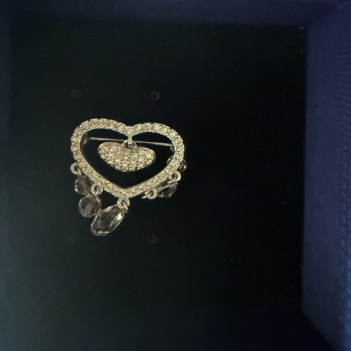 Swarovski brooch like new, silver