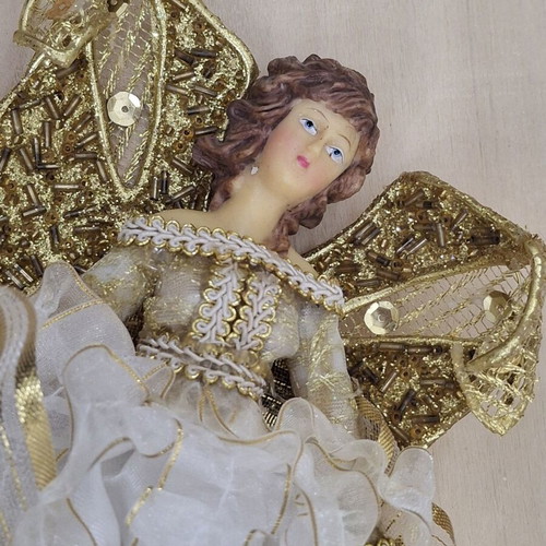 White hanging angel with gold wings, porcelain body