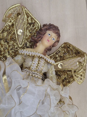 White hanging angel with gold wings, porcelain body