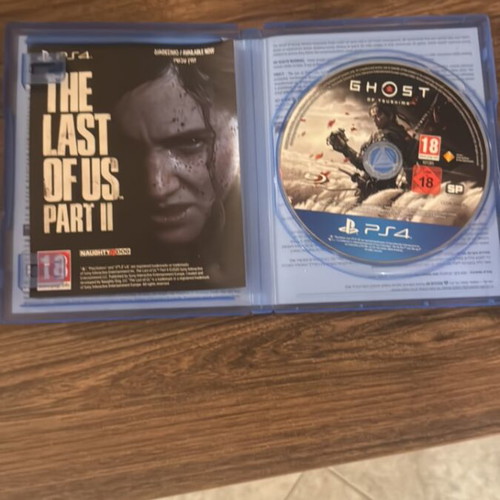 Ghost of Tsushima PS4 & PS5 game like new with box and booklet