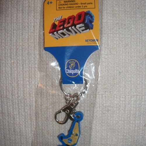 Chiquita Lego Movie 2-2019 Warner Bross keychain new, sealed packaging