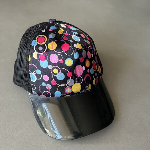 Hat size S with colorful circles and visor, like new, black