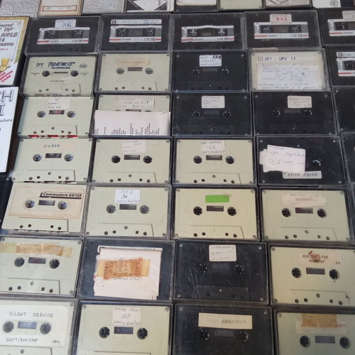 Collectible pack of 50 cassette videogame programs ZX Spectrum Commodore used, 1980s