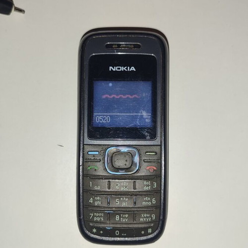 Nokia 1208 used with original charger, black