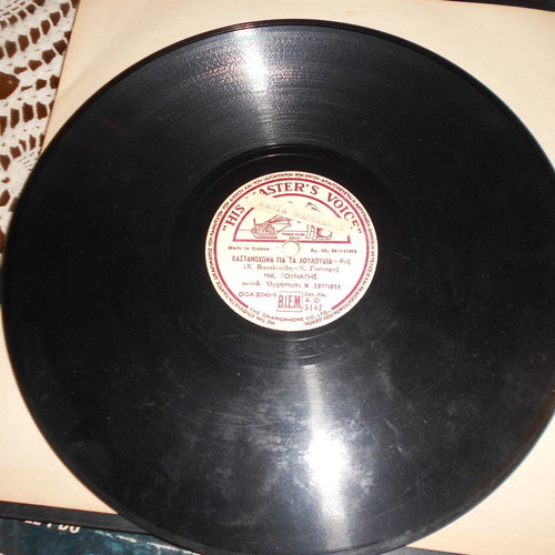 Old 33" records used with various artists and soundtracks
