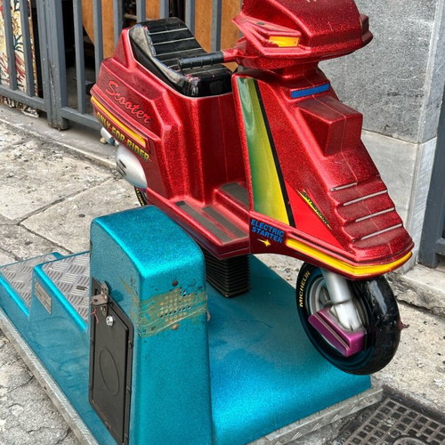 Coin-operated scooter used from the 90s, dimensions 74x106 cm