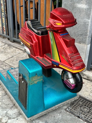 Coin-operated scooter used from the 90s, dimensions 74x106 cm