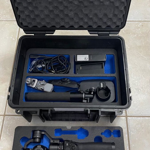Dji Osmo 4K like new with 4 batteries and professional case