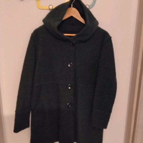 Wool coat in cypress color with oversized hood, used