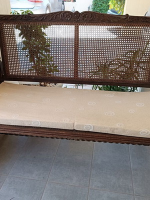 Wooden antique sofa used with Viennese cane and cushion