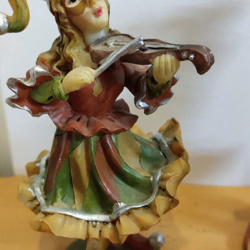 Musical figures handmade rare set of 4 polyresin like new