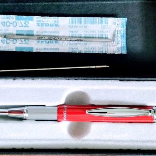 Folding pen new in red and silver color