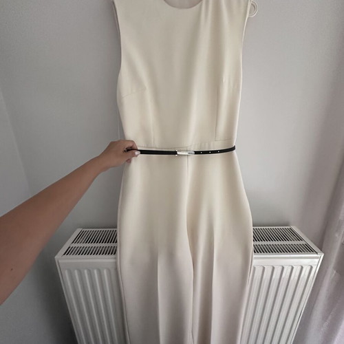 Jumpsuit Mango like new with black belt, size large, beige