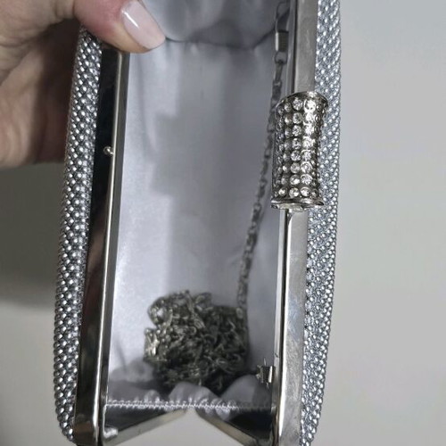 Clutch bag silver like new with chain for shoulder