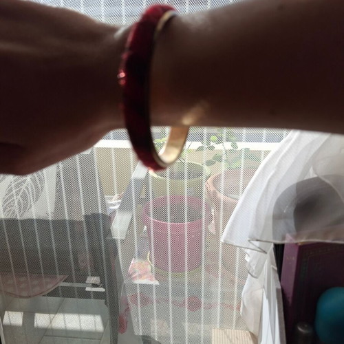 Zebre bracelet like new, burgundy and black with gold collar