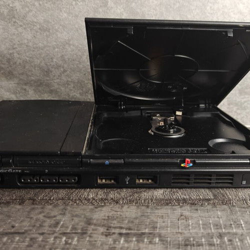 PlayStation 2 Slim console bundle with 2 games