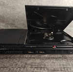 PlayStation 2 Slim console bundle with 2 games