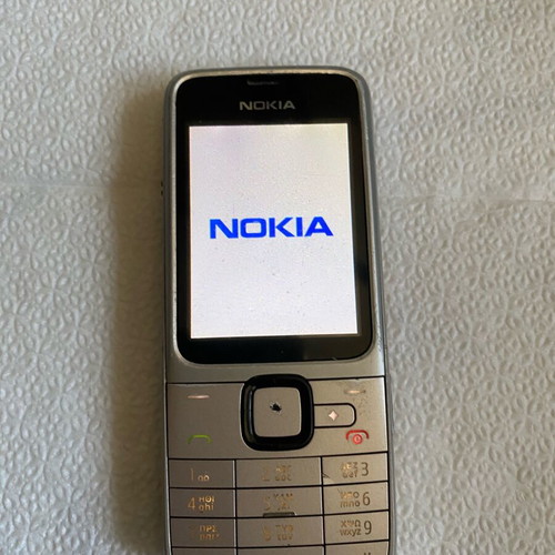 Nokia 2710c-2 mobile phone used, silver, collectible