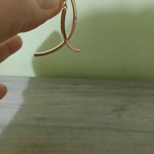 Earrings new unworn golden